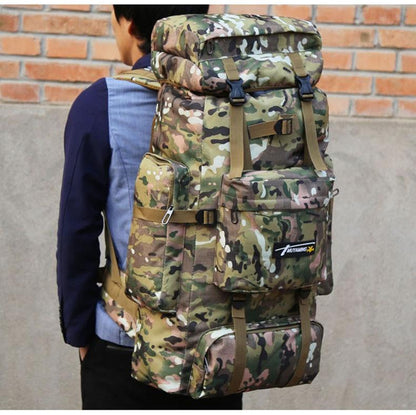 man-carrying-army-camo-large-military-tactical-capacity-bag-for-camping-hiking-traveling