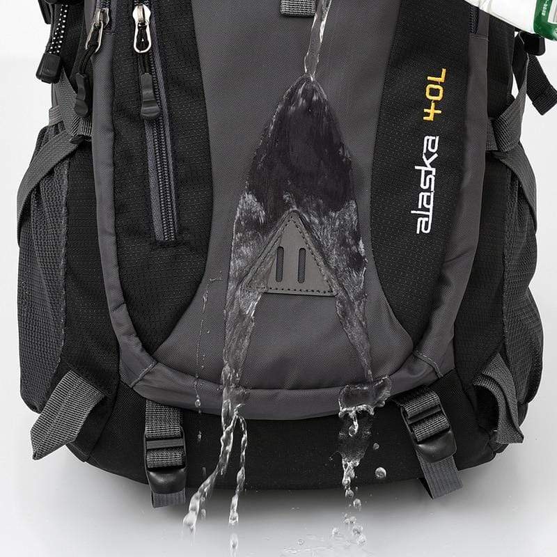 medium-mountain-black-backpack-bag-with-charger-for-camping-walking-hiking-fishing-climbing-water-dropping-on-it