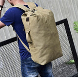 man-with-light-brown-extra-large-traveling-bag-for-hiking-camping-fishing-climbing