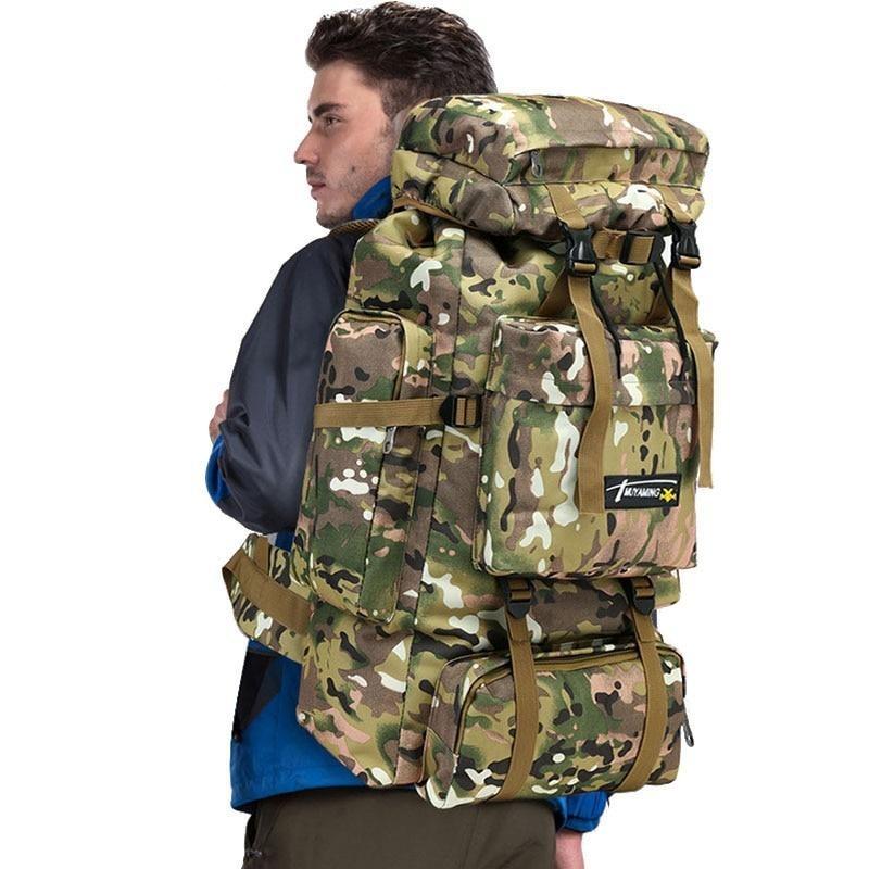 man-carrying-large-military-tactical-capacity-bag-for-camping-hiking-traveling
