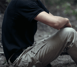 man-wearing-SWAT-special-forces-pants-for-hiking-surviving-climbing-and-nature